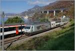 The SBB Re 460 037  Lattesso  with his IR 90 on the way to Brig by Villeneuve. 

14.11.2024 