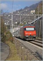 An SBB Re 460 is pushing its IR90 towards Genève Aéroport at Veytaux Chillon.

January 14, 2025
