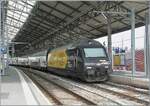 The SBB Re 460 028 (Re 460 91 85 4 460 028-4 CH-SBB) features the attractive advertising decoration    Schweizer Wanderwege / Suisse Rando / Sentieri Svizzeri / Sendas Svizras .