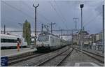 The BLS Re 465 008-1 with his RE Neuchâtel - Bern in Neuchâtel.