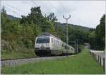 The BLS Re  465 008 with a RE from La Chaux-de-Fonds to Bern by Chambrelien.