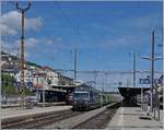 The BLS Re 465 005 with his RE from Bern to La Chaux-de-Fonds by his stop in Neuchâtel.