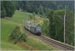 The BLS Re 465 002 wiht his RE on the way to La Chaux-de Fond by Les-Hauts-Geneveys.