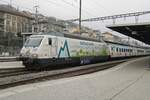 A stroke of luck: on 1 January 2020 BLS ad vertiser 465 008 calls at Neuchatel with a train set, that advertises for Kambly, a well known brand of cookies (atleast in Switzerland!).