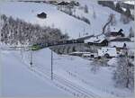 The BLS Re 465 001 with the GoldenPass Express 4068 on the way from Montreux to Interlaken Ost by Garstatt.