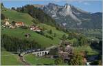 Once again the GoldenPass Express GPX 4064 from Montreux to Interlaken Ost, now supplemented by the  Interface  car and the BLS Re 465 014, while the MOB Ge 4/4 8001 is waiting in Zweisimmen for the return train to Montreux. The picture was taken at Garstatt. 

Sept. 29, 2023