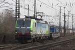 On 9 February 2023 BLS Cargo 475 414 hauls a trailer train out of Emmerich into the Netherlands.