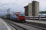 Rain or no rain, SBBCI 193 469 hauls one of many intermodal trains through Arth-Goldau on a wet 15 May 2026.