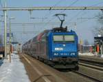 BLS Re 185 525-3 and an other one with a S-Bahn service from Thun to Fribourg in Kiesen. 
29.12.2008