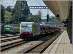 BLS Re 486 503 is hauling a goods train trough the station of Spiez on May 28th, 2012.