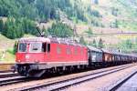 Scanned picture of 11679 with a steel train at Gschenen on a very rainy 26 May 2007.