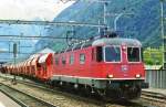 Scanned picture of 11667 with stone refuse train at Erstfeld on 27 May 2007.