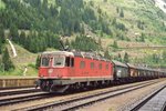 Steel train is banked by 11679 at Göschenen on 18 June 2001.