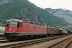 Mixed freight with 11654 departs from Erstfeld toward Bellinzona on 15 September 2011.