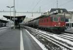 Re 6/6 with a Cargo train in Renens VD  21.12.2009