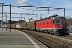 SBB 11628 speeds through Thun with a mixed freight on 23 March 2017.