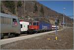 The SBB Re 6/6 11615 (Re 620 015-8) Kloten is approching the SNCF BB 26061 in Vallorbe.