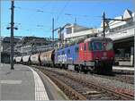 The SBB Re 6/6 11671 (Re 620 071-1)  Othmarsingen  waits with the  Spaghetti  train in Lausanne for the onward journey towards Domodossola. April 30, 2025