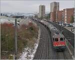 The SBB Re 6/6 11618 (Re 620 018-2)  Dübendorf  is traveling between Lengnau and Grenchen Süd with a tank car train.

January 13, 2026