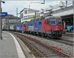 The two SBB Re 6/6 11671 (Re 620 071-1) 'Othmarsingen' and Re 6/6 11672 (Re 620 072-9) 'Balerna' leave Lausanne station towards Brig with their EWLV train to Zurich via Kandersteg (!). May 23, 2025