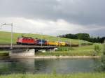 Re 4/4 and Re 6/6 with a Freight-Train on the Reuss-Brdge at Oberrüti 26.05.2011