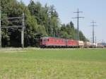 Re 10/10 with a Freighttrain by Lyssach, 07.07.2011
