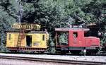 Tem No 41 (electric and diesel use possilble) and a maintenance wagon of BLS (Bern-Ltschberg-Simplon) at Felsenburg, August 27th, 1979.