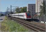 Between Lengnau and Grenchen Süd is a SBB ICN on the way to Zürich and in the background runs SBB RABe 523 052 to Biel/Bienne.