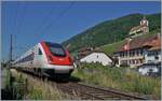 Near Ligerz, on the last remaining short section of single-track railway at the Jurasüdfussstrecke 210/southern foot of the Jura Mountains 210, is a SBB RABDe 500 (ICN) on the way to Lausanne. 

19.06.2025