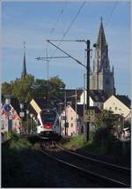 The SBB  Seehas  RABe 521 201 on the way to Engen on the Rheinbridge in Konstanz.