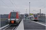 The SNCF X27569 to Belfort and the SBB RABe 522 220 to Biel/Bienne in Meroux TGV.