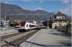 SBB RABe 522 211 to Biel/Bienne and in the shadow the RABe 522 209 to Meroux TGV in Grenchen Nord.