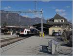 SBB RABe 522 211 to Biel/Bienne and in the shadow the RABe 522 209 to Meroux TGV in Grenchen Nord.