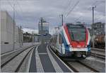 The SBB CFF LEX RABe 522 226 is arriving at Lancy Pont Rouge.