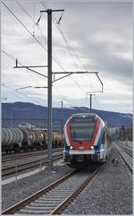 The SBB CFF LEX RABe 522 226 is arriving at Lancy Pont Rouge.