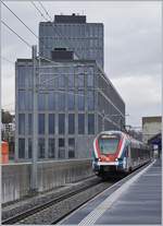 The SBB LEX RABe 522 215 to Annemasse (SL4) in Lancy Pont Rouge.