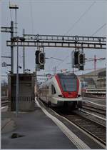 The SBB RABe 522 210 is leaving Lausanne. 

27.02.2020