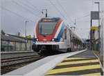 The SBB CFF LEX RABe 522 223 on the way from Annecy to Coppet by his stop in Pringy.