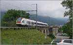 The SBB RABe 522 205 on the way to Biel/Bienne on the Mösli Viadukt in Grenchen.