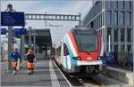 The SBB LEX RABe 522 229 by his stop in Lancy Pont Rouge.