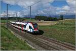 The SBB LEX RABe 522 215 by Satigny on the way to Geneva.

02.08.2021