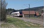 The SBB RABe 522 207 ist the RE 18124 on the way from Neuchatel to Frasen between Les Verrieres and Pontralier near La Cluse et Mijoux.