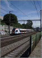 Four tracks, three routes, two power systems, and one train – between St-Jean and Genève, the SBB LEX RABe 522 228 is operating as RL5 23042 on the journey from Genève to La Plaine.  
The train runs on the track remaining after the co ...