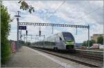 The BLS MIKA RABe 528 134 operates as IR 1868 on the journey from Basel SBB to Biel/Bienne and is leaving the BLS / MLB station Grenchen Nord.