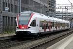 SBB 523 007 departs from Muttenz with an S-Bahn to Lörrach on 22 March 2017.