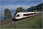 A SBB RABe 523 on the way to Villeneuve by the Castle of Chillon.