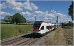 The SBB RABe 523 015 on the way to Villeneuve by Arnex.