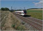 The SBB RABe 523 027 on the way to Vallorbe by Arnex.

25.07.2020