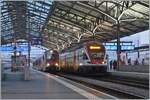 The SBB RABe 523 104 on the way to Grandson and the 511 103 on the way to Annemasse in Lausanne.