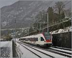 The SBB RABe 523 028 on the way to Aigle by Villeneuve.

25.01.2021